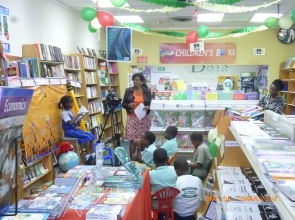 Karen with young readers during live streaming of a World Book Day event at Days Books (March 2013)